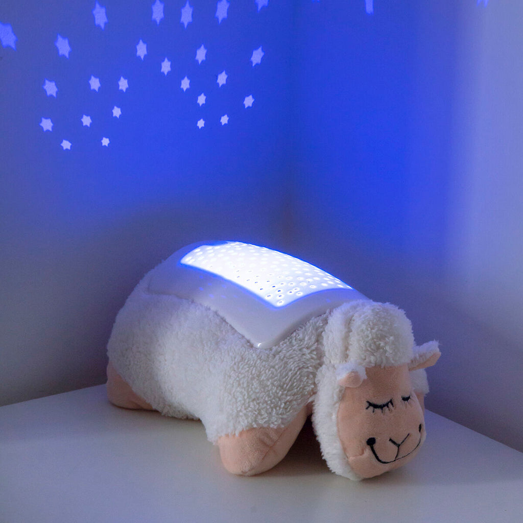 Plush Toy Projector Sheep InnovaGoods projecting stars on the wall, perfect for children's nighttime comfort.