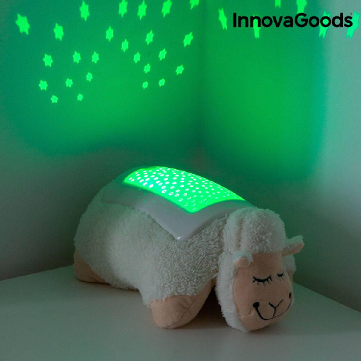 Plush Toy Projector Sheep InnovaGoods displaying a soothing star projection in a child's room.